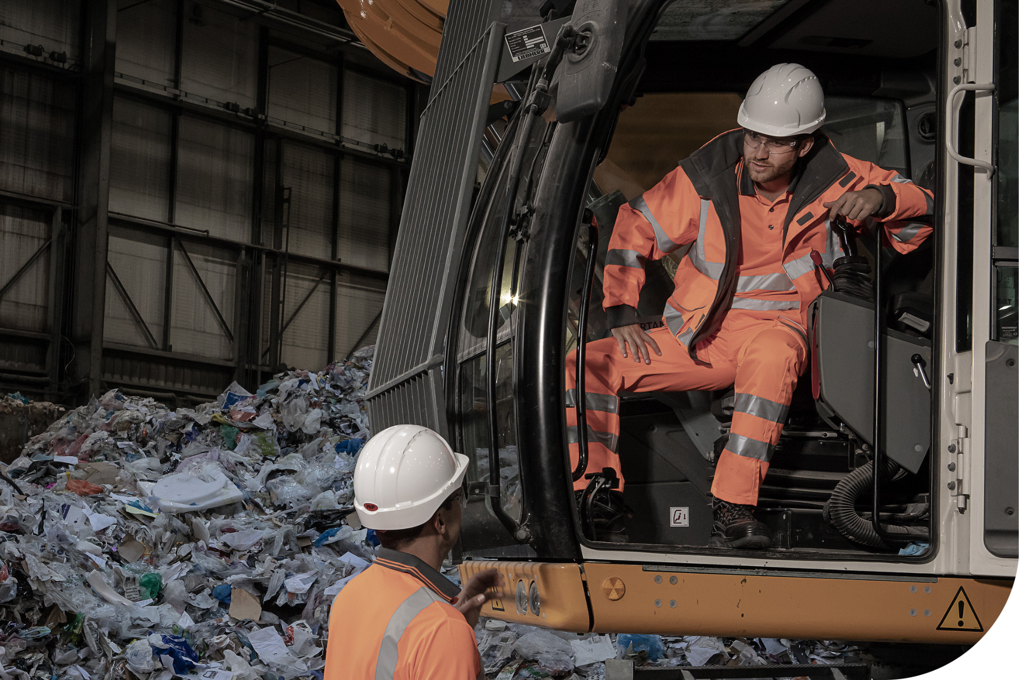 Waste and Environmental workers wearing hi-vis.