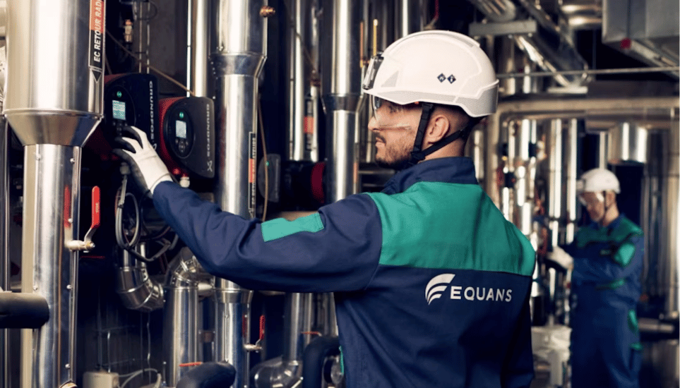 Equans workers in PPE.